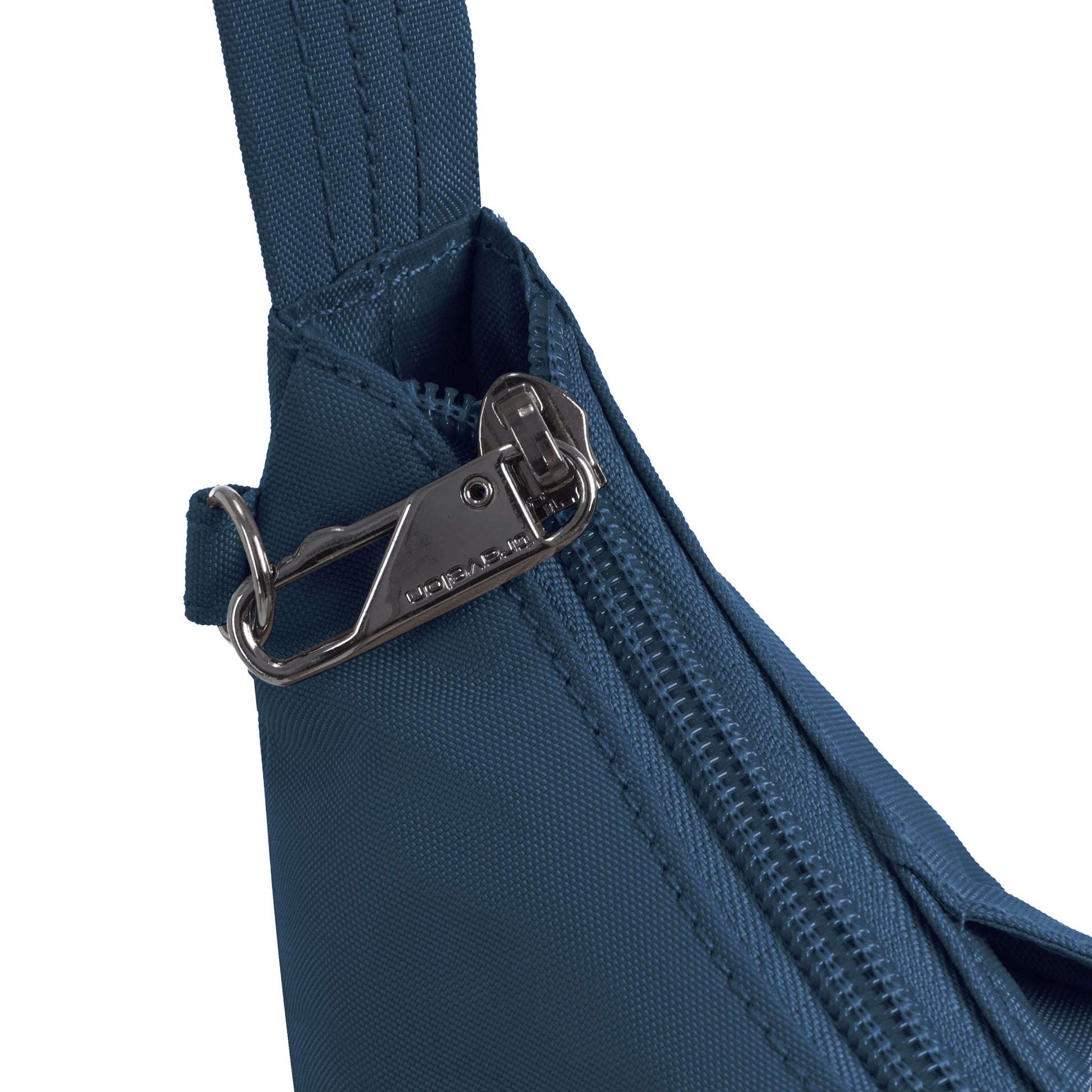 Close-up of the Travelon Runways Anti-theft Medium Crossbody in blue with silver zipper and detailed stitching.