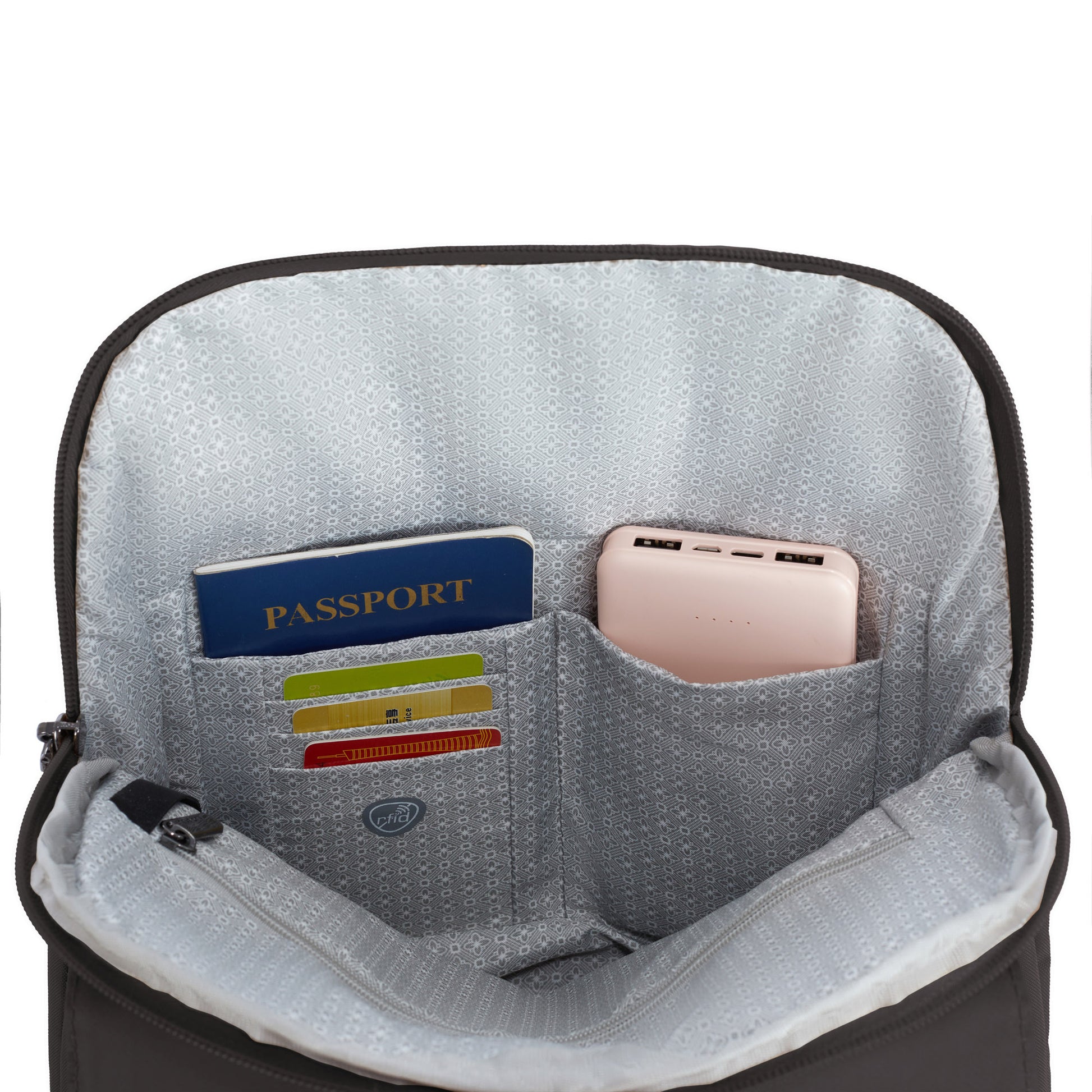 Access the Travelon Runways Anti-theft Compact Backpack's organized pocket for passport, cards, and power bank.
