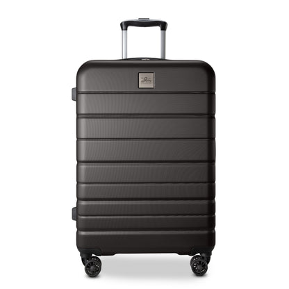 Skyway Epic 2.0 Hardside Medium Spinner luggage with four wheels and telescopic handle, shown on white.