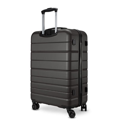 Skyway Epic 2.0 Hardside Medium Spinner luggage in black, four wheels & telescopic handle, upright on white.