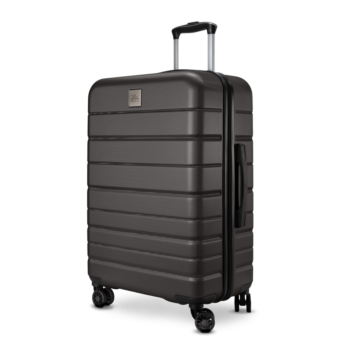 Skyway Epic 2.0 Hardside Medium Spinner, dark gray, stands upright with four wheels and telescopic handle.
