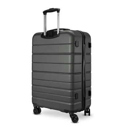 Skyway Epic 2.0 Hardside Medium Check-in Spinner in gray, upright with four wheels and handle extended.