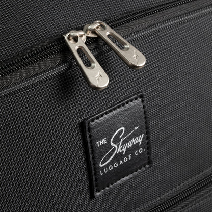 Black zipper pulls and a Skyway branded patch on a Skyway Flair 2.0 3-Piece Luggage Set.