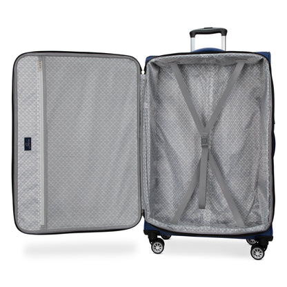 Open navy blue Skyway Flair 2.0 3-Piece Luggage Set suitcase with a grey patterned interior and compression straps.
