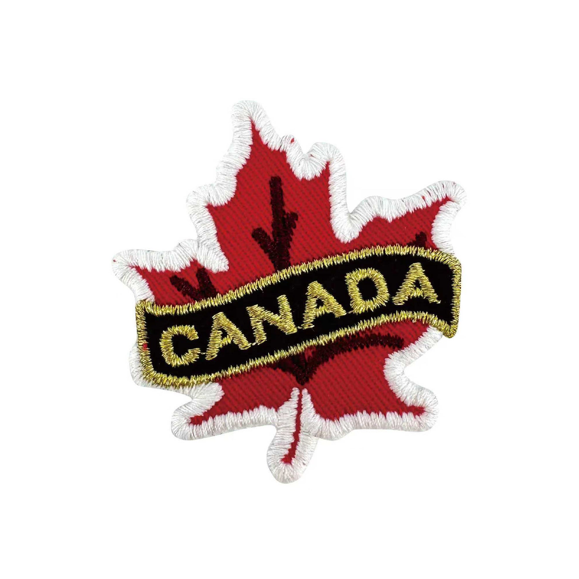 Northern Icons Canada Maple Leaf iron-on patch with gold "CANADA" embroidery on black.