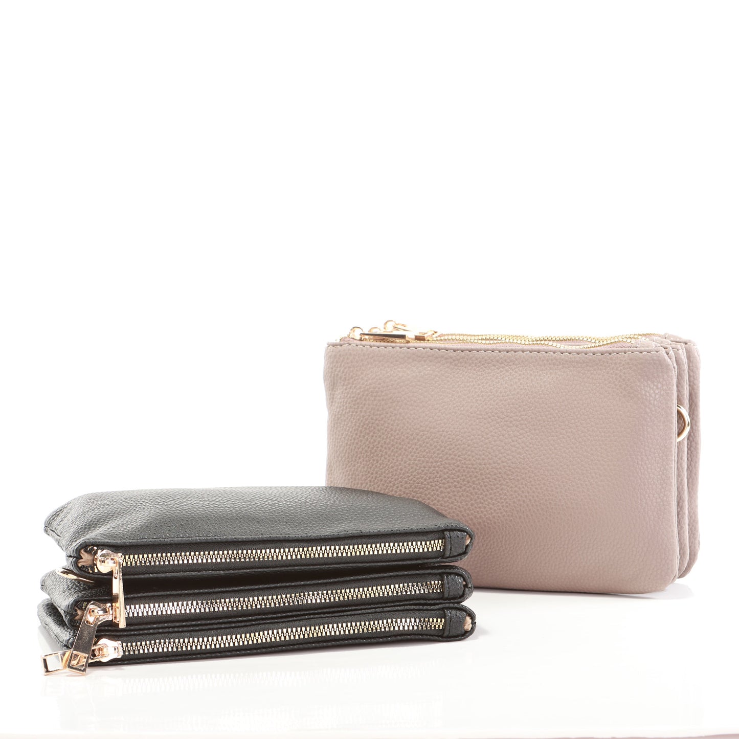 Alina's Triple Zip RFID Crossbody/Wristlet, taupe, front view with black one laying in front with zippers showing