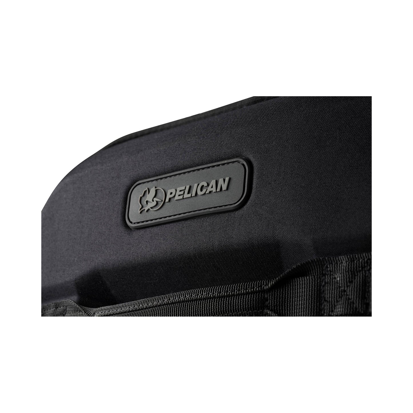 Pelican™ Aegis Carry-on 4-Wheel Hybrid Duffel, black, close up of Pelican logo on front of case.