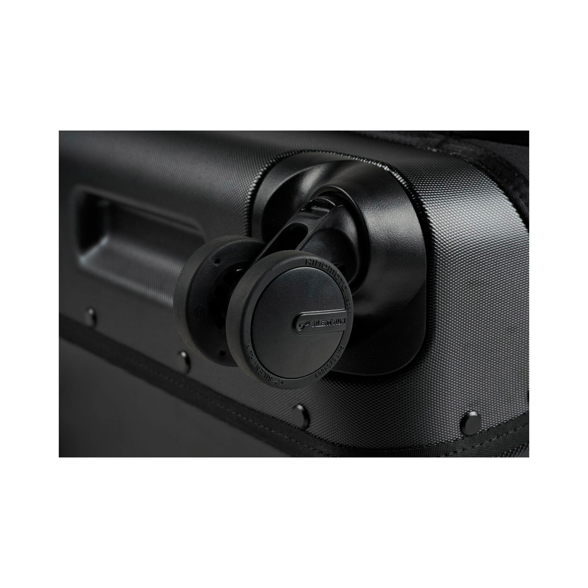 Pelican™ Aegis Carry-on 4-Wheel Hybrid Duffel, black, close up of spinner wheel.