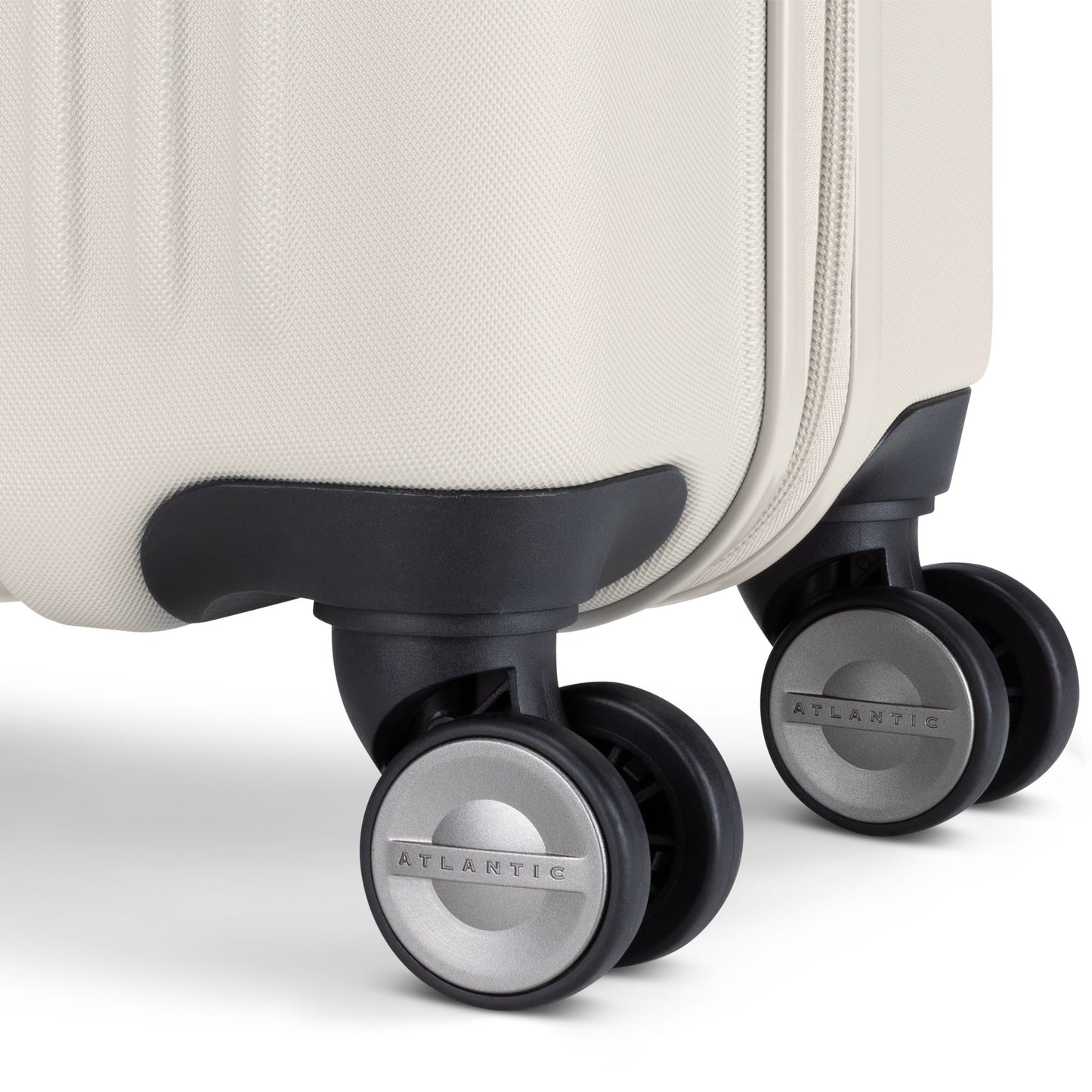 Close up of spinner wheels on pumice stone Atlantic Propeller 19" Hardside Spinner Carry-on