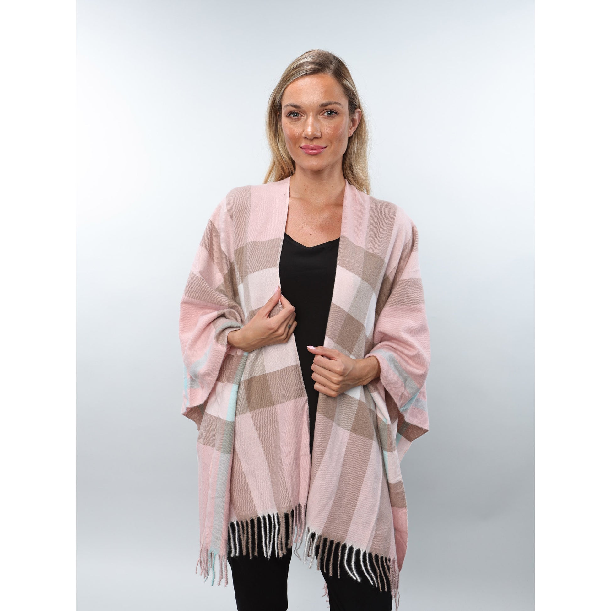 Woman wearing Alina's Plaid Cape in pink