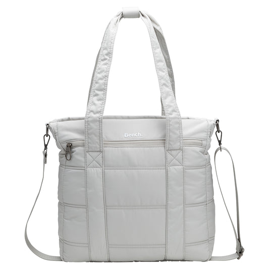 Product Image – Bench Georgia Satchel in light gray, quilted with two handles, zipper pocket, and adjustable shoulder strap.