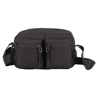 Bench Nylon Crossbody: A compact nylon bag with two zip pockets, mesh sides, and adjustable strap—ideal for daily use.