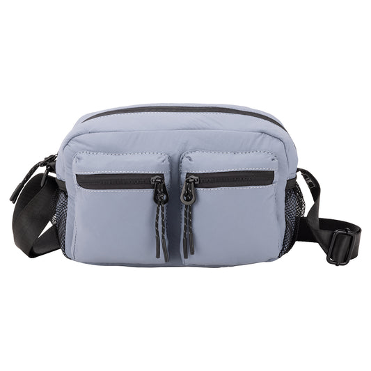 Product Image – Bench Nylon Crossbody by Bench in light blue, features two zip pockets, mesh sides, and a black adjustable strap.
