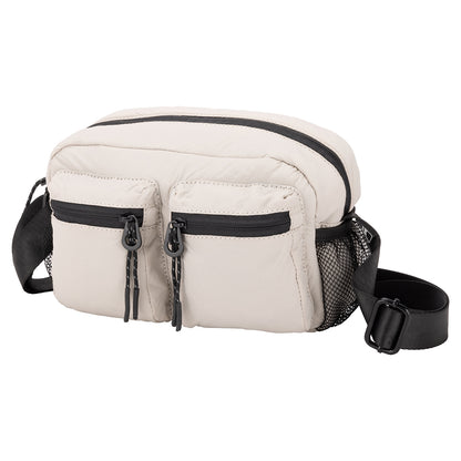 Bench Nylon Crossbody by Bench: light beige nylon, two zippered pockets, black strap, mesh side—great for everyday.