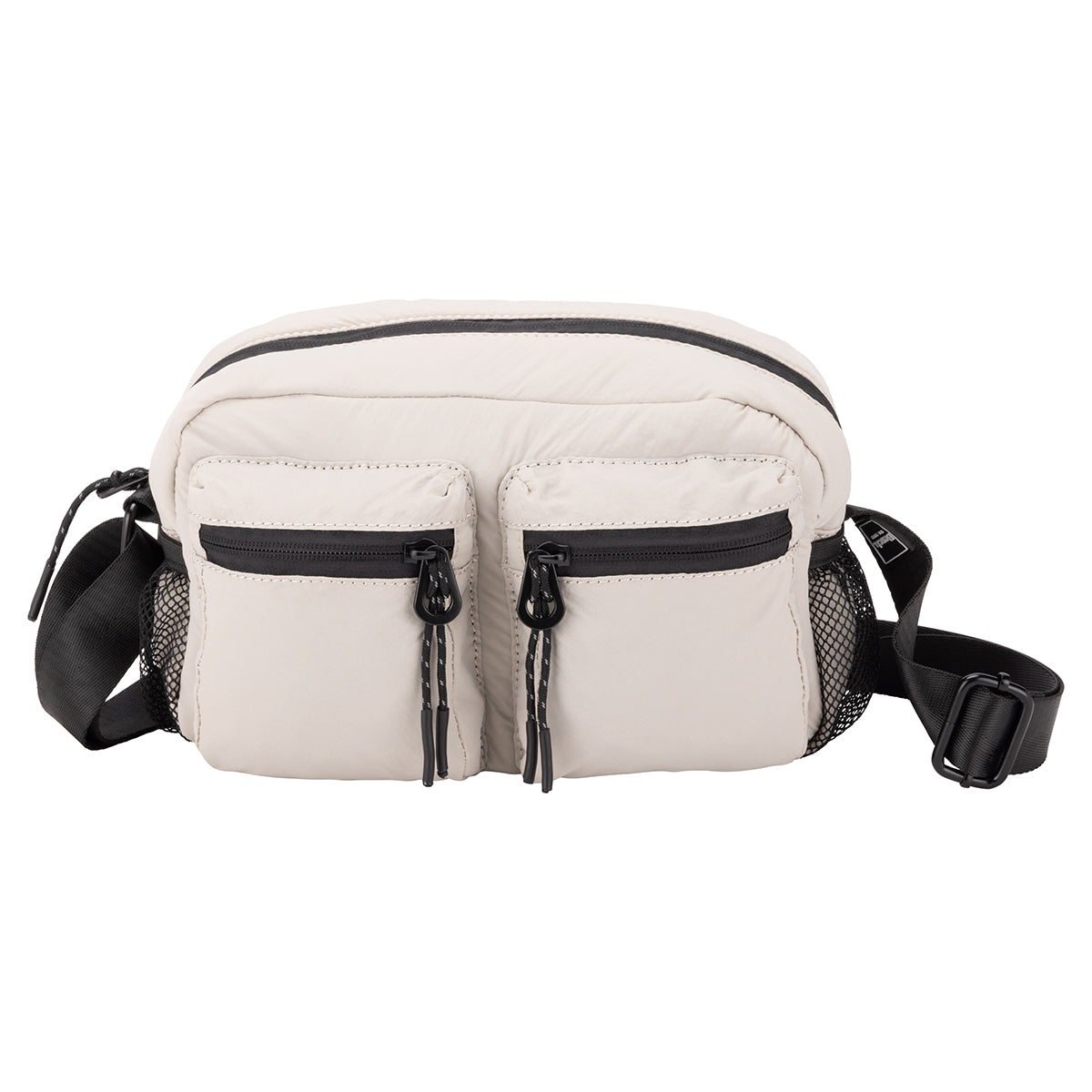 Bench Nylon Crossbody: beige nylon bag with two front zip pockets, black zippers, and adjustable strap.