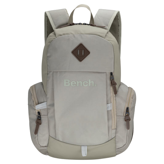 Product Image – The Bench Terra Backpack is a light beige, durable bag with zippered pockets and padded straps.