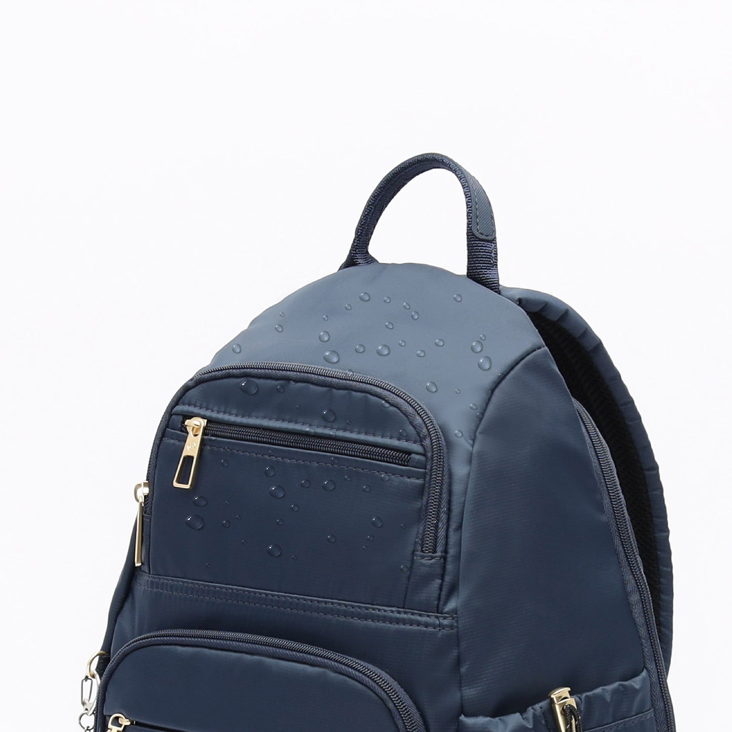 The Beside-U Aileen R1 Backpack is navy, water-repellent nylon with gold zippers from the Nutopia Pro collection.