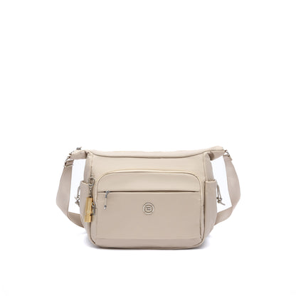 Beside-U Jest R2 Crossbody: water-repellent beige nylon, front zip pocket, adjustable strap, small logo.