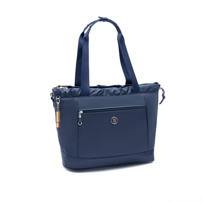 The Beside-U Candy Tote is a navy blue anti-theft bag with dual handles, front zip pocket, and round logo.
