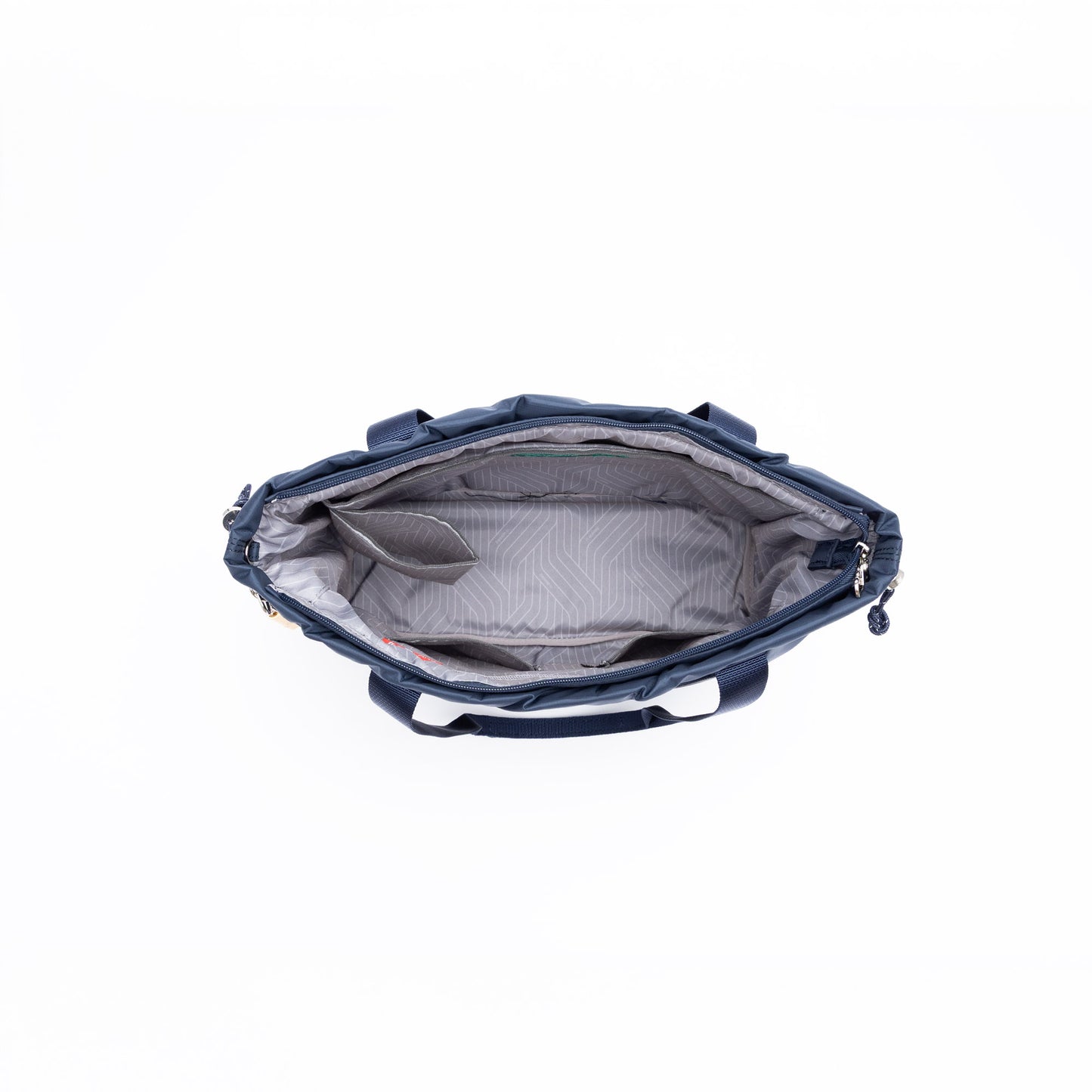 Top view of an open, empty Beside-U Candy Tote in navy blue with gray interior and multiple compartments.