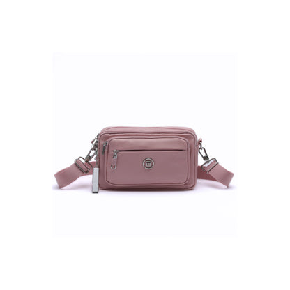 Beside-U Gelato Crossbody in pink with RFID pocket, front zipper, and adjustable strap by Beside-U.