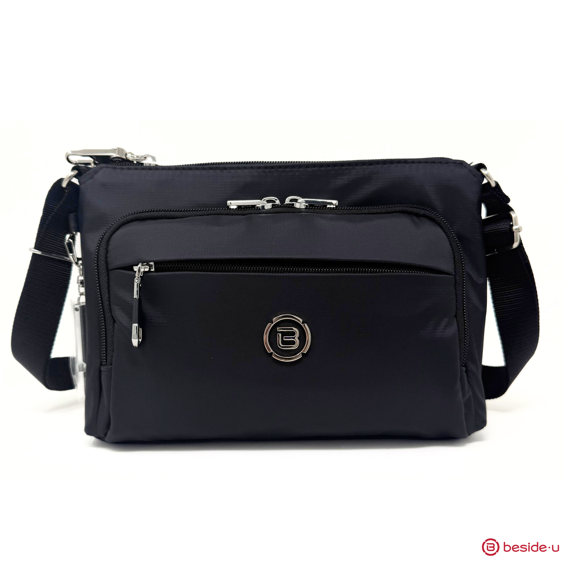 Beside-U Jubilee Crossbody: black anti-slash bag with RFID pocket, front zipper, and adjustable strap.