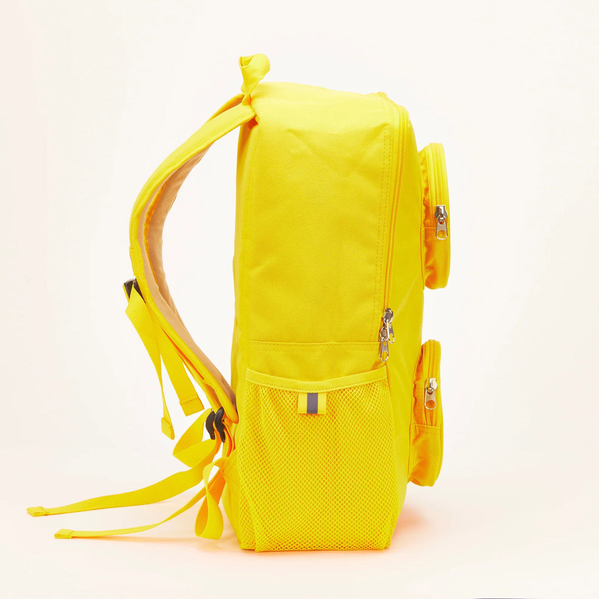 Bright yellow LEGO® Brick Backpack - ONLINE ONLY with circular side pockets and a mesh water bottle pocket.
