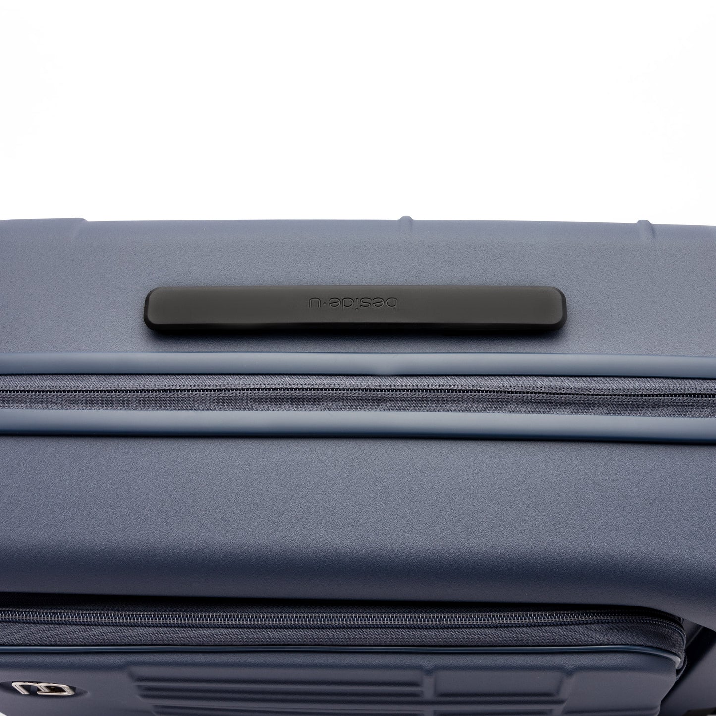 Close-up of the Beside-U Posh Voyage 20" Carry-on, a blue polycarbonate suitcase with top black handle.