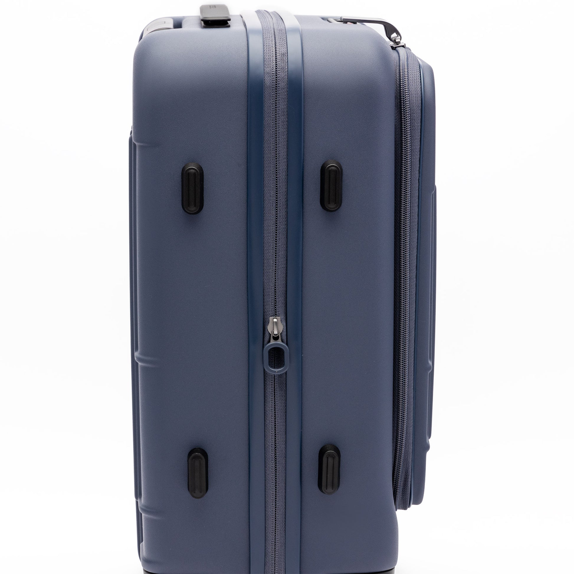 The Beside-U Posh Voyage 20" blue polycarbonate carry-on has side handles, black feet, and a central zipper.
