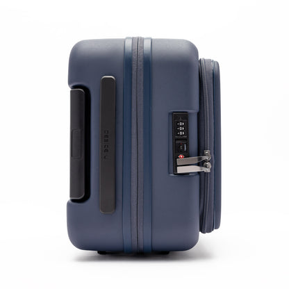 Beside-U Posh Voyage 20" Carry-on in navy blue polycarbonate with TSA lock, shown from the side on white.