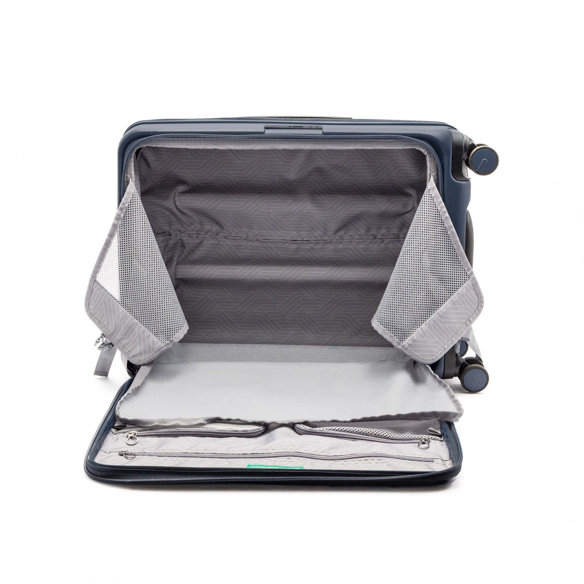 The Beside-U Posh Voyage 28" Spinner, open with gray lining and divider pockets, lies flat on a white background.