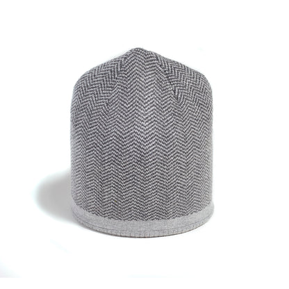 Brume Keele Peak Hat by Brume: a gray unisex knit beanie with herringbone pattern on a white background.
