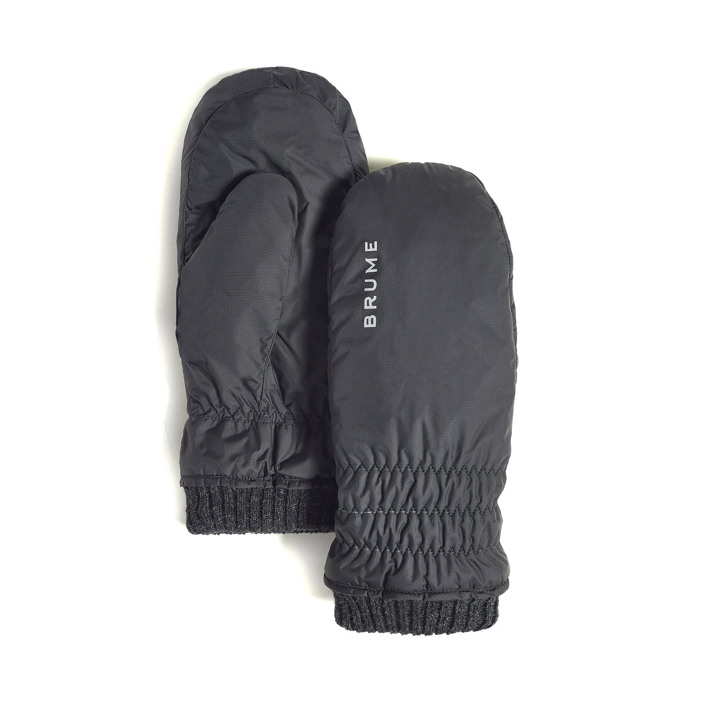 A pair of black Brume Magog Mitts—wind and water resistant, elastic wrists, "BRUME" on one mitten.