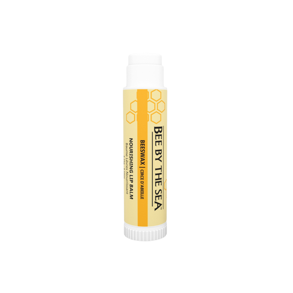 Bee by the Sea Nourishing Lip Balm - ONLINE ONLY with a yellow label and honeycomb design.