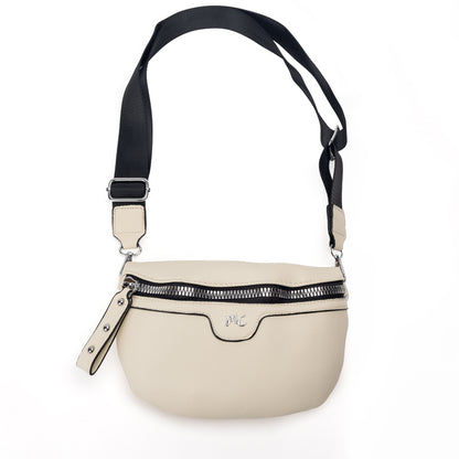 Miss Caprice Waist/Crossbody Bag in cream with adjustable black nylon strap for convenient hands-free style, front view.