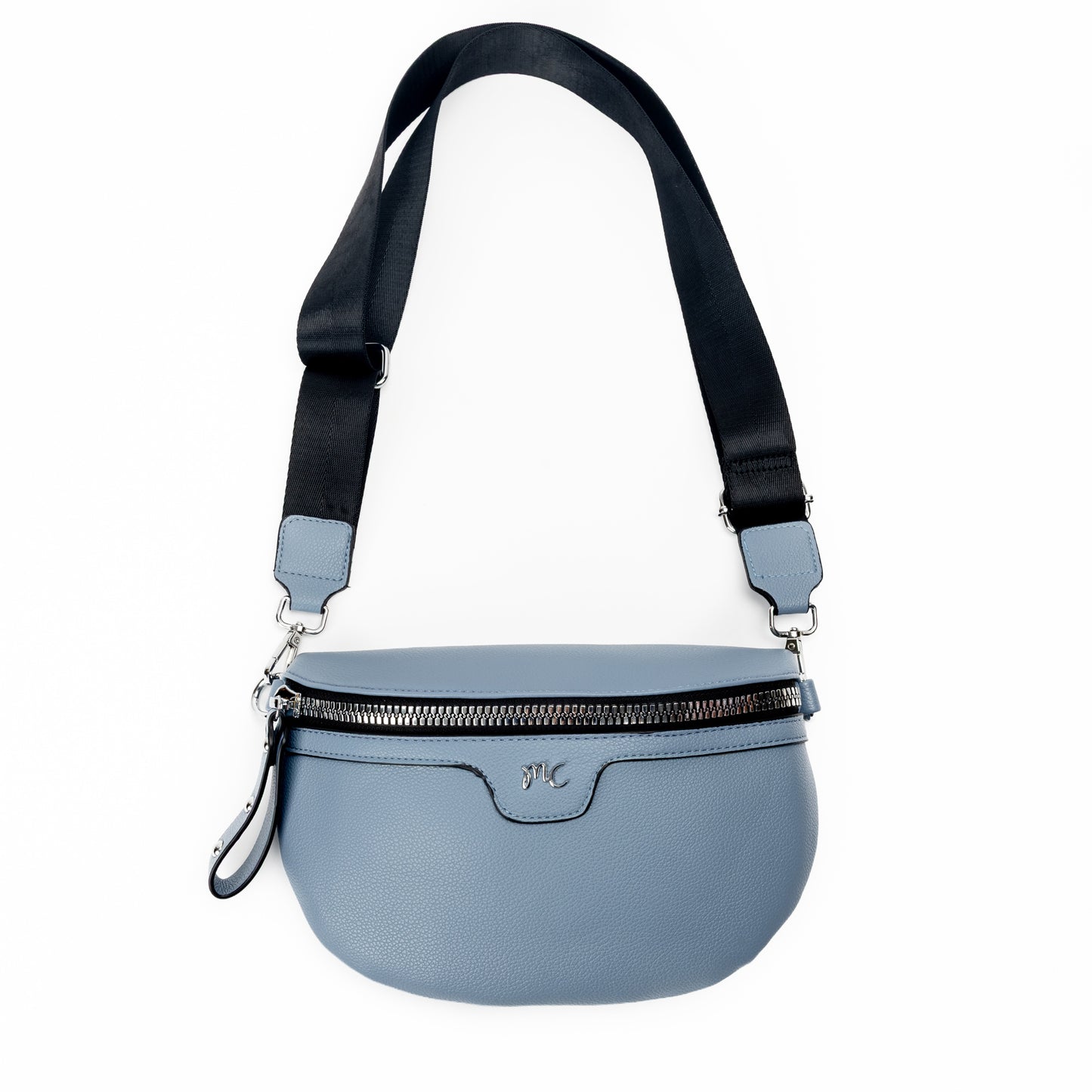 Miss Caprice Waist/Crossbody Bag in denim blue with adjustable black nylon strap for convenient hands-free style, front view.