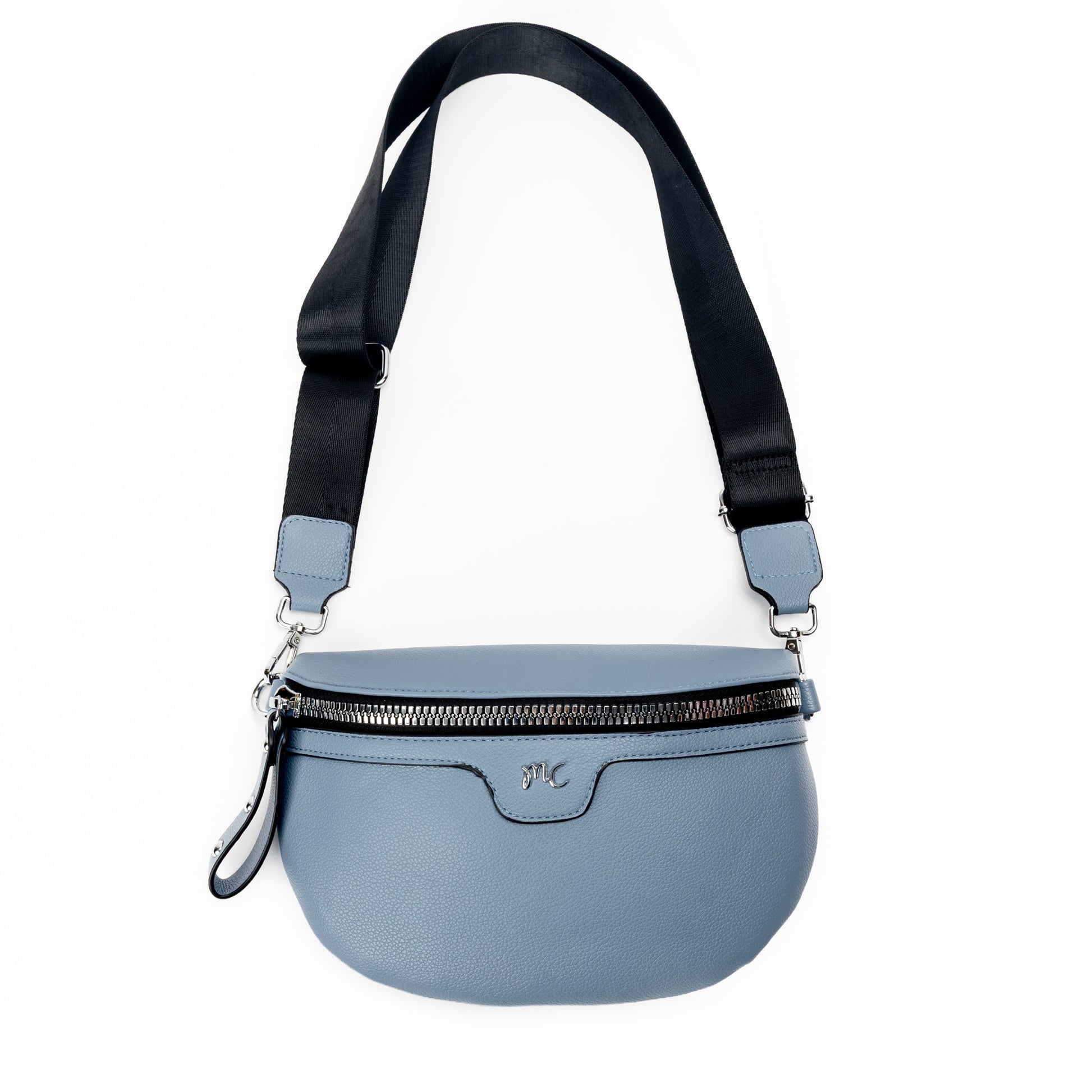 Miss Caprice Waist/Crossbody Bag in denim blue with adjustable black nylon strap for convenient hands-free style, front view.