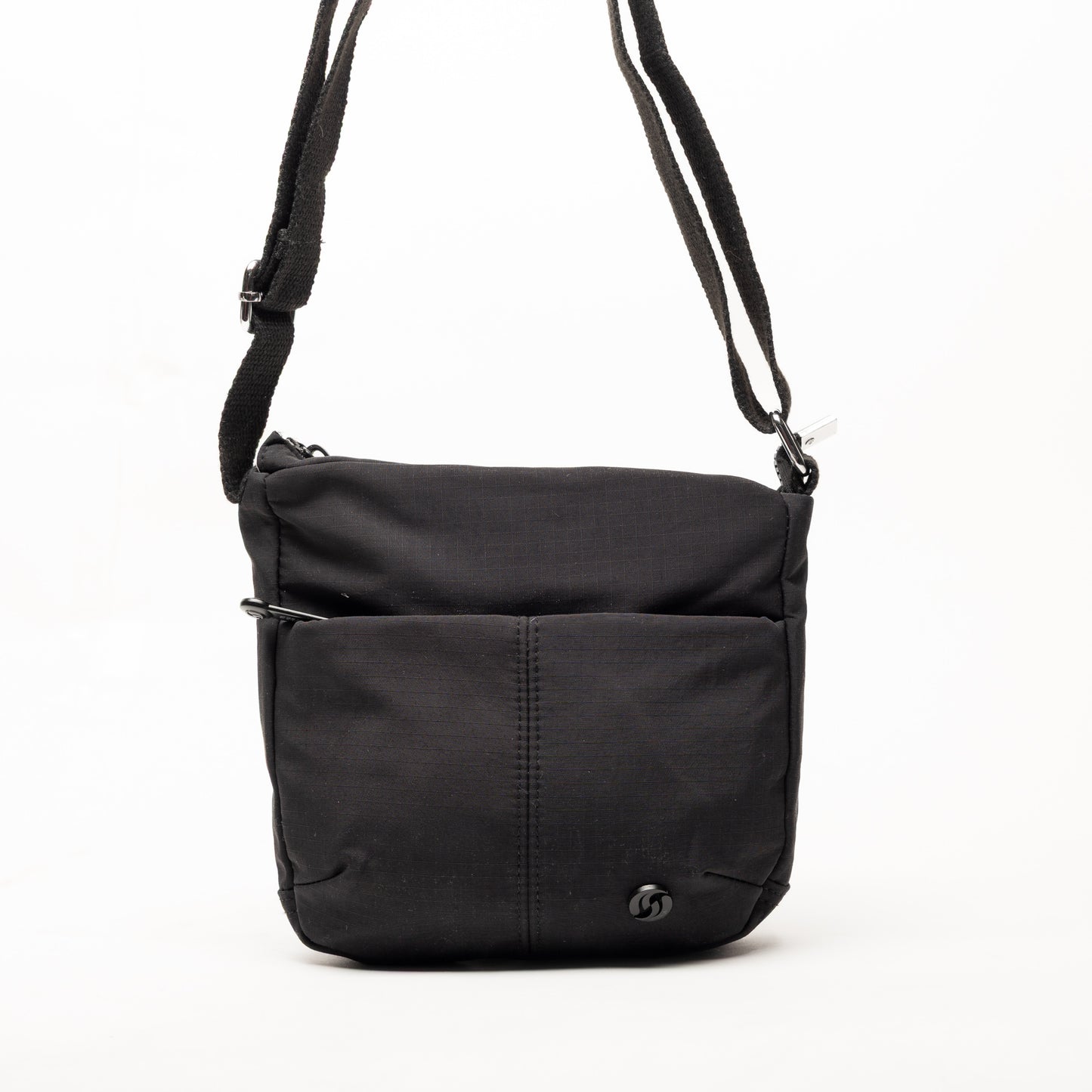 Miss Caprice Small Nylon Crossbody: black with front pocket, adjustable strap, small logo—ideal for travel.