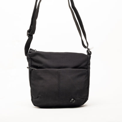 Miss Caprice Small Nylon Crossbody: black with front pocket, adjustable strap, small logo—ideal for travel.