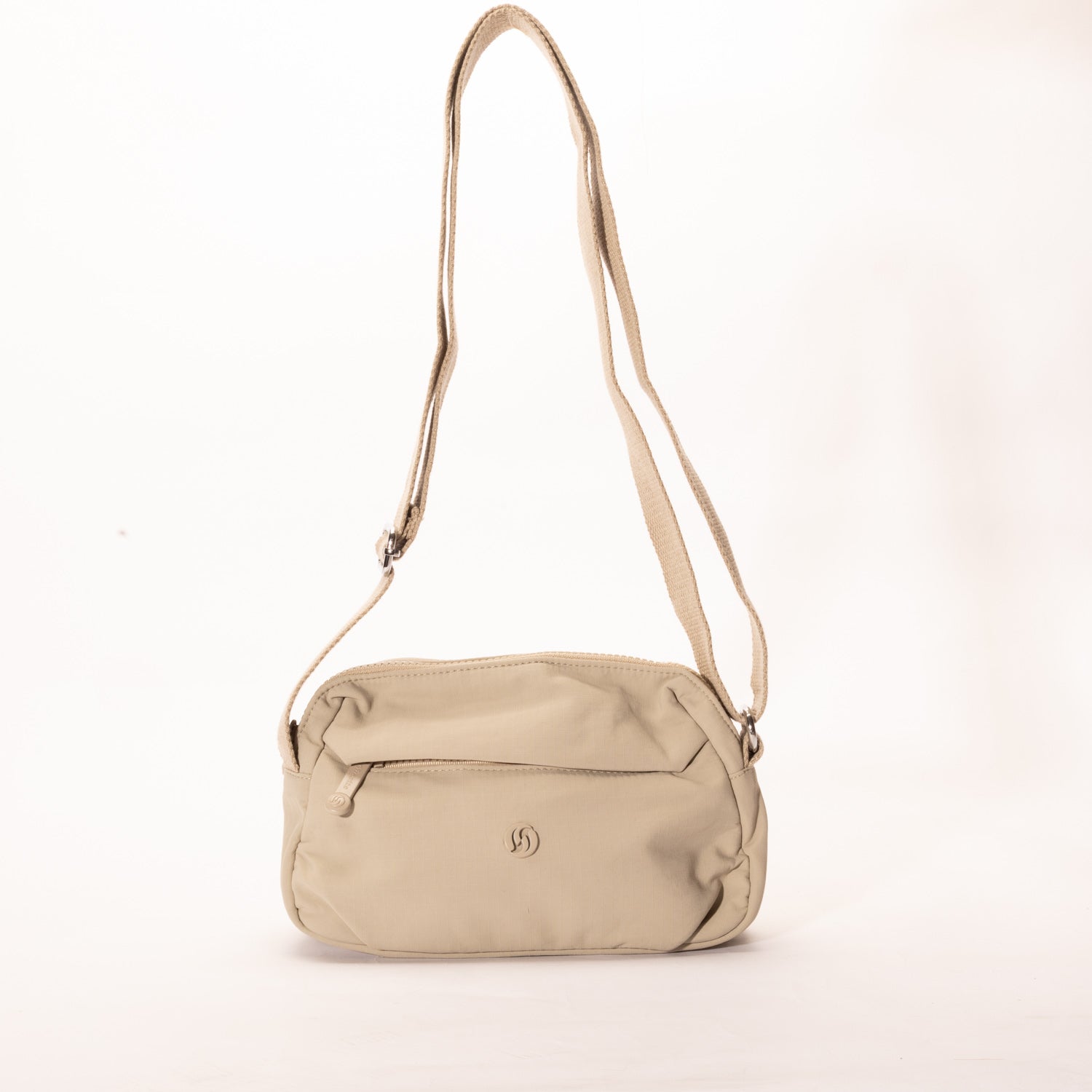 Miss Caprice Nylon Crossbody: Lightweight nylon bag with front zip pocket and adjustable strap for daily use or travel.
