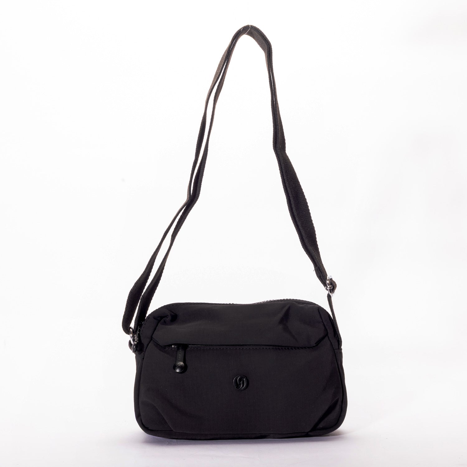The Miss Caprice Nylon Crossbody is a lightweight bag with a front zip pocket—ideal for travel or daily use.