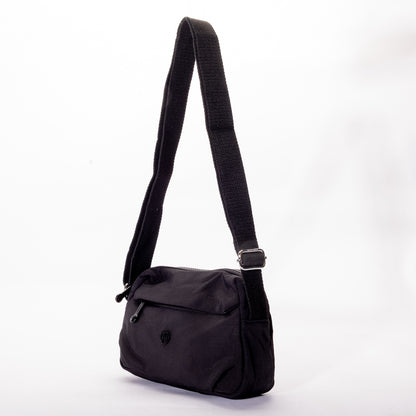 The Miss Caprice Nylon Crossbody is a lightweight bag with a zip pocket and adjustable strap for daily use.