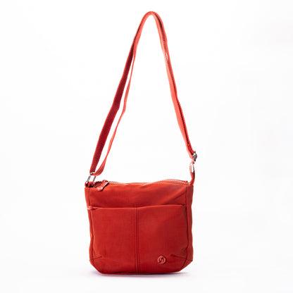 Miss Caprice Small Nylon Crossbody: red, long strap, zip top, front pocket, circular logo.