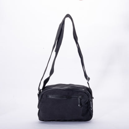 Miss Caprice Compact Nylon Crossbody has two zippered compartments, perfect for daily use, shown on white background.