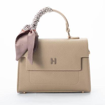 Miss Caprice Hope Handbag: Beige faux leather, scarf-wrapped top handle, metallic "H" on front flap.