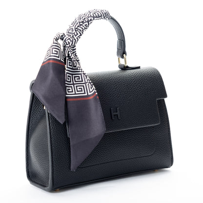 Miss Caprice Hope Handbag: Black faux leather with top handle, styled with a black and white patterned scarf.
