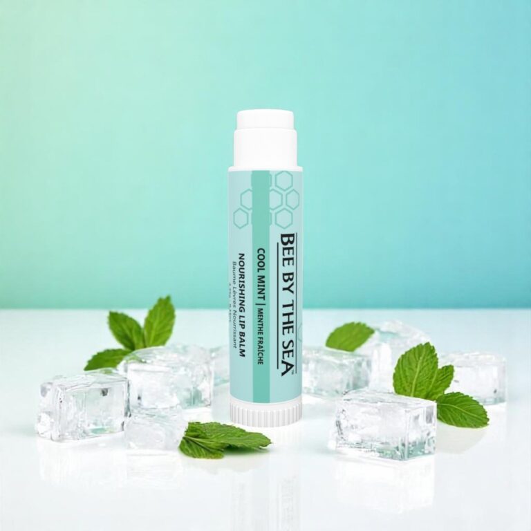 Bee by the Sea Nourishing Lip Balm - ONLINE ONLY, shown with ice, mint leaves & sea buckthorn.