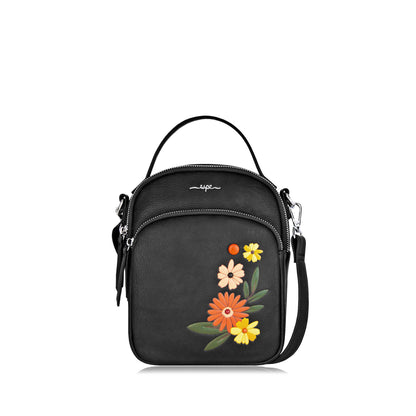 Espe Daliah Crossbody, black, with yellow, orange and light pink flowers embroidered on front pouch