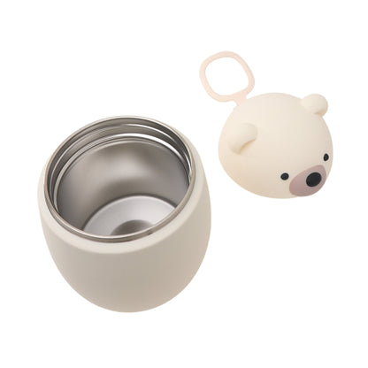 Open cream-colored Asobu Bestie Foodie Jar next to its bear-shaped lid with a carrying loop.