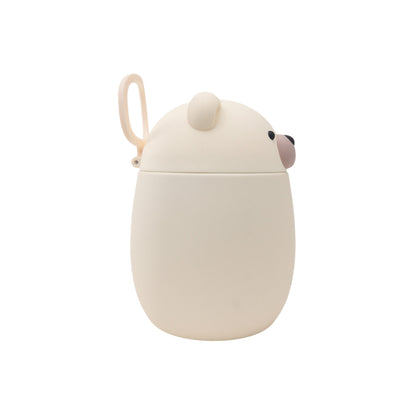 Off-white, bear-shaped Asobu Bestie Foodie Jar with a small carrying loop on the side.